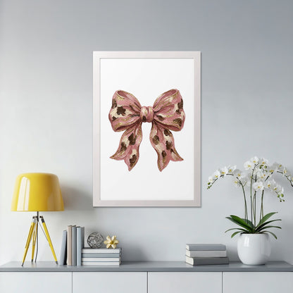 Pink bow illustration with gold accents in a white frame.