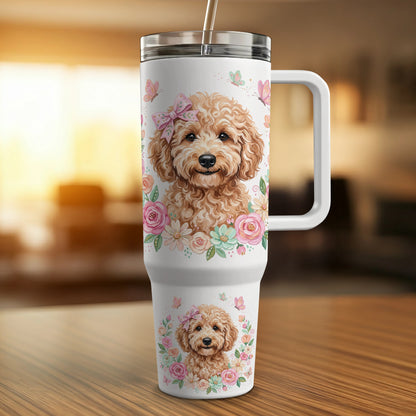 White tumbler with doodle dog and floral design, featuring a handle.