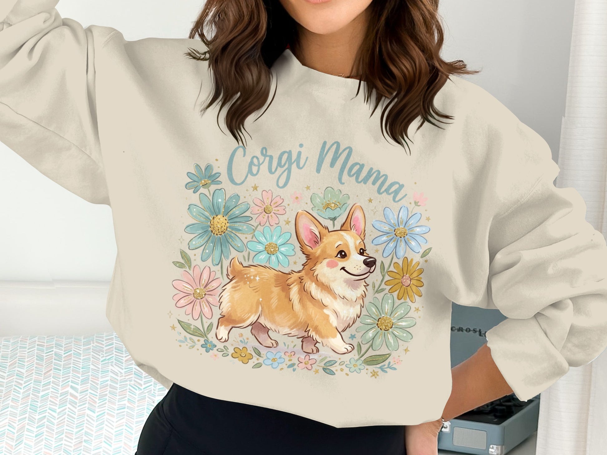 Cream sweatshirt with "Corgi Mama" text and a floral corgi illustration.