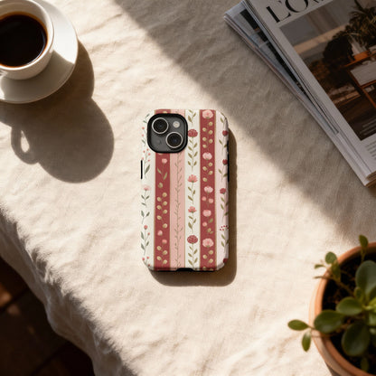 iPhone case with a vertical stripe floral pattern in pink and cream.