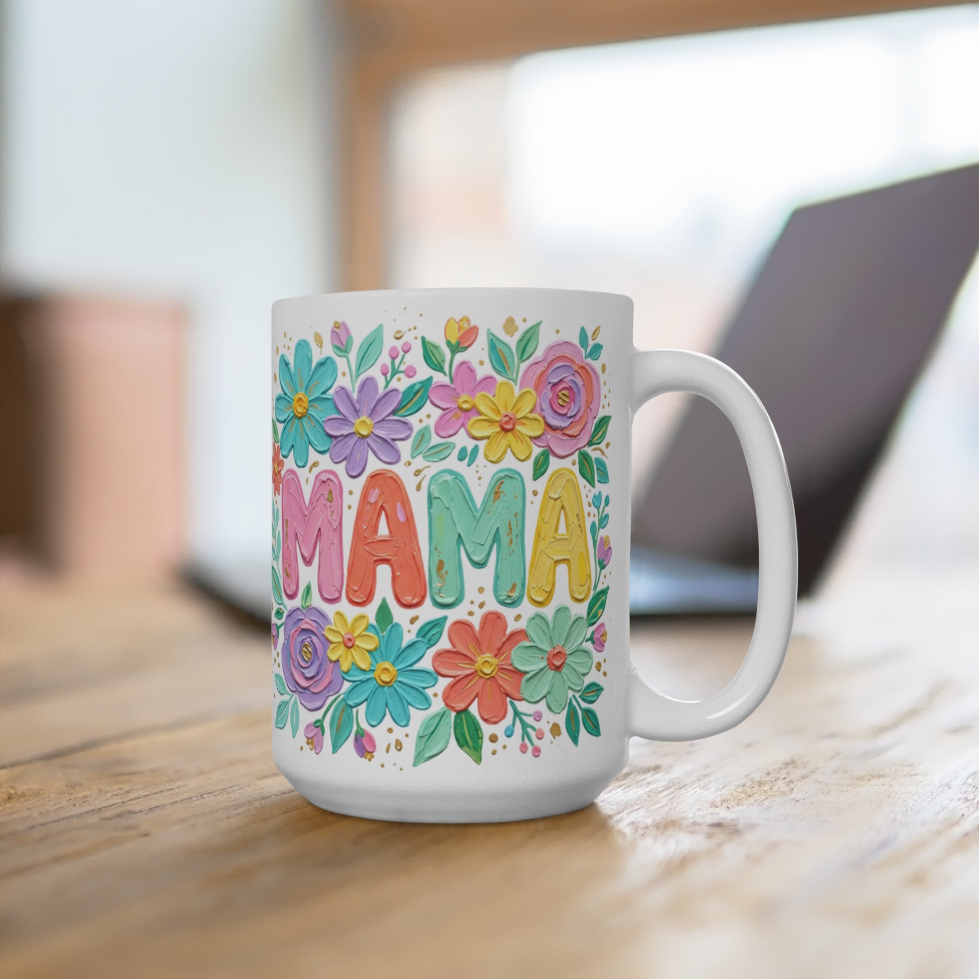 White mug with colorful floral design and "MAMA" text.