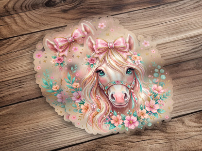 Pink pony adorned with bows and flowers, with a light sparkle effect.