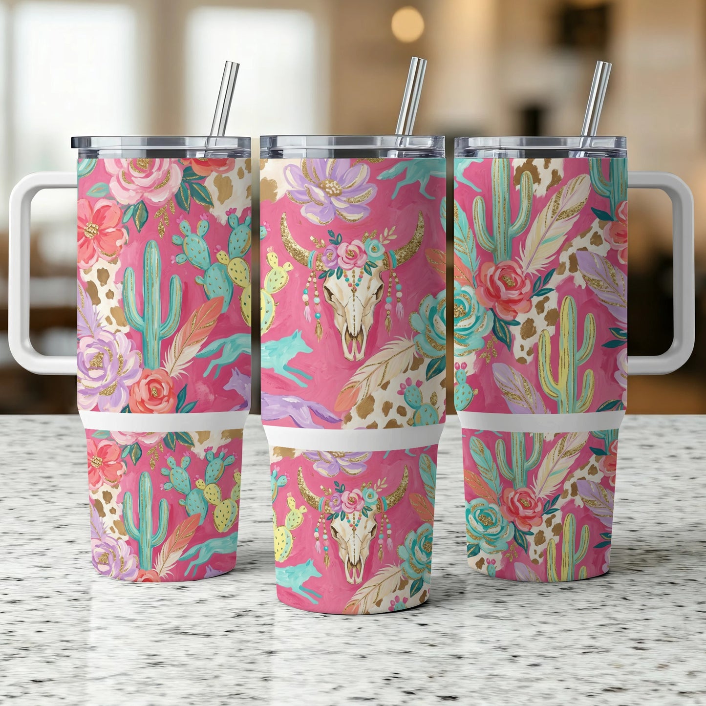 Pink floral and cactus pattern on three tumblers with animal skull and feathers.