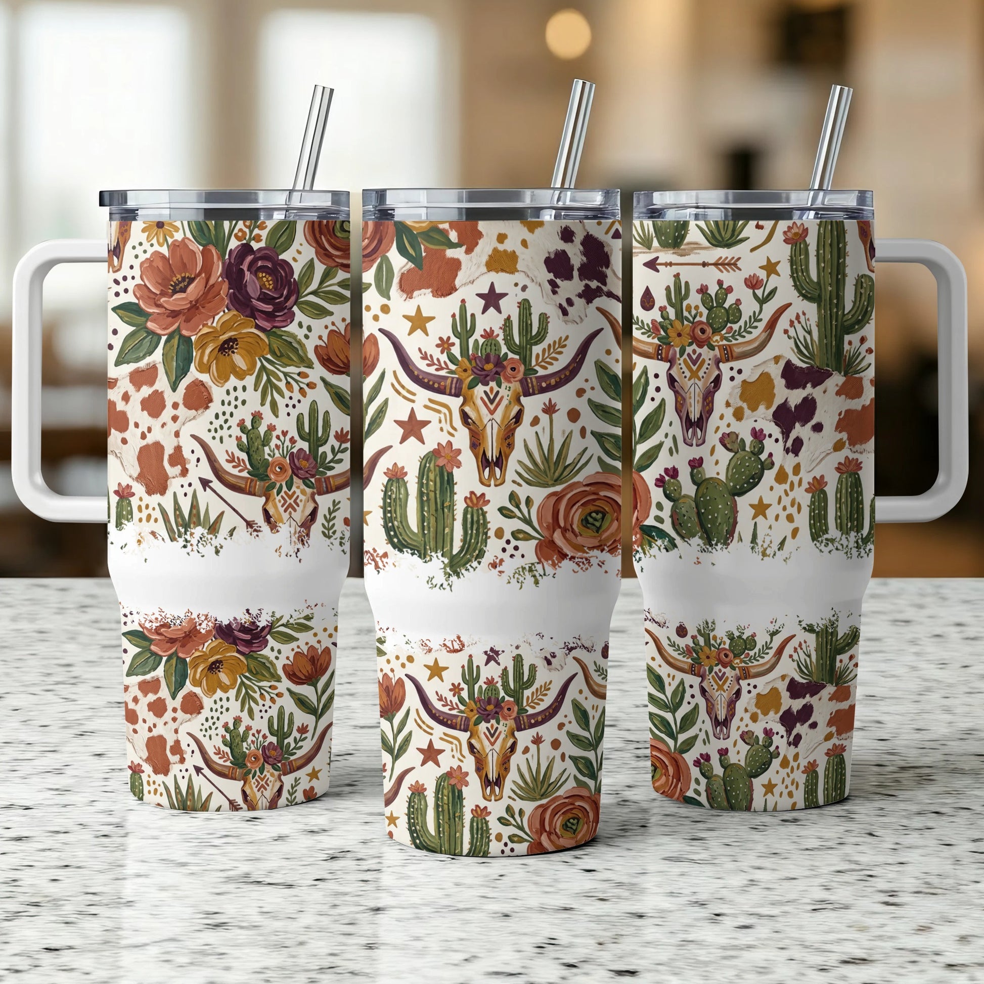 Three tumblers with a floral and cactus skull pattern.