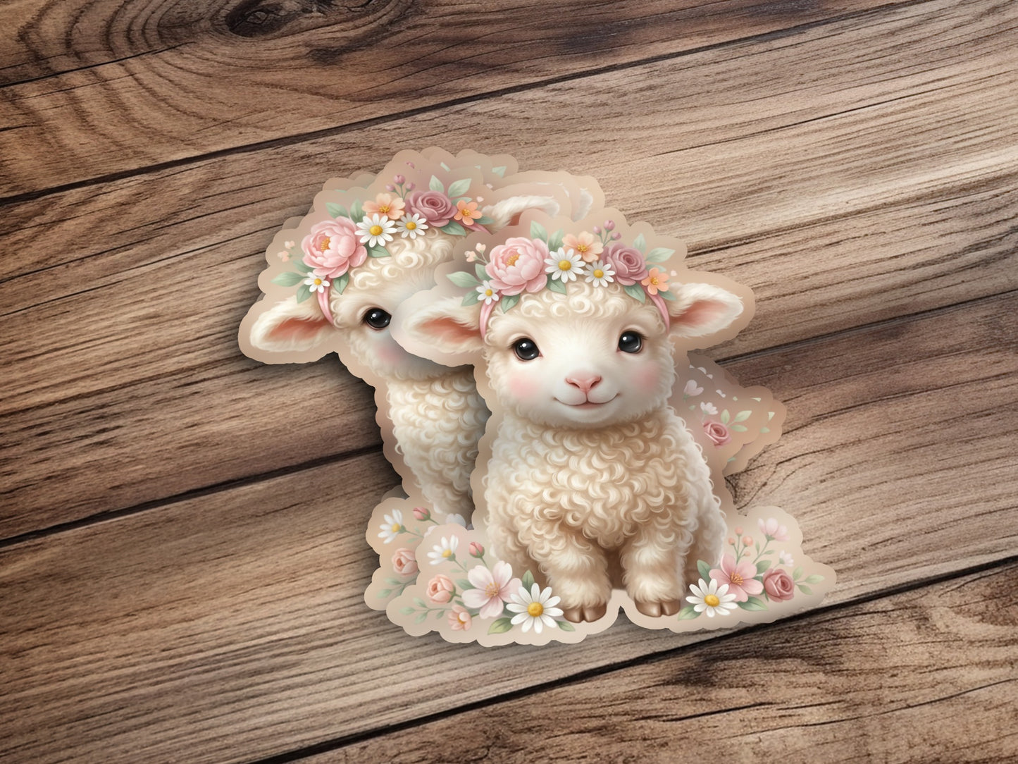Two fluffy sheep wearing flower crowns on a wooden background.