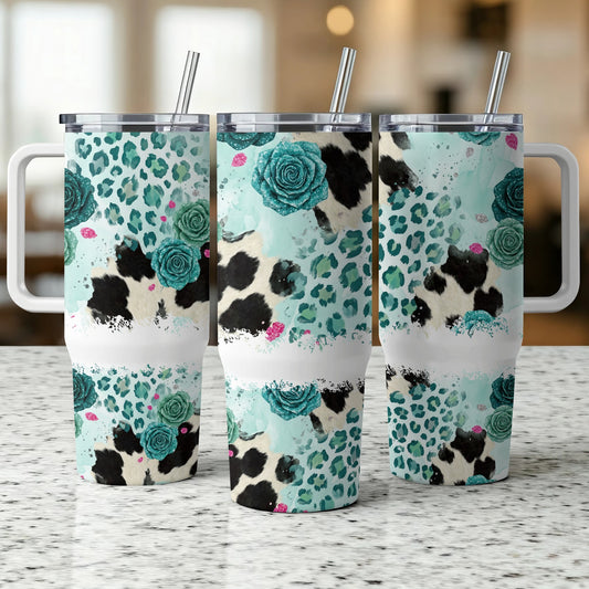 Three tumblers with cow print, leopard print, and floral designs.