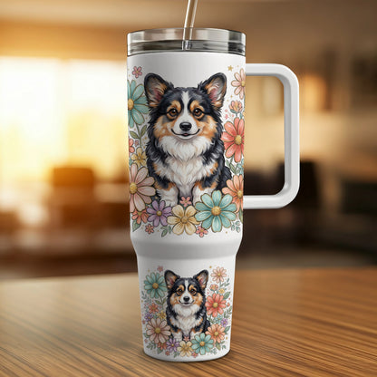 White travel tumbler with a corgi and floral design.