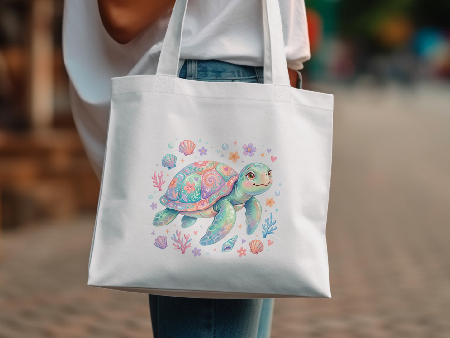 White tote bag with colorful cartoon sea turtle and ocean elements print.
