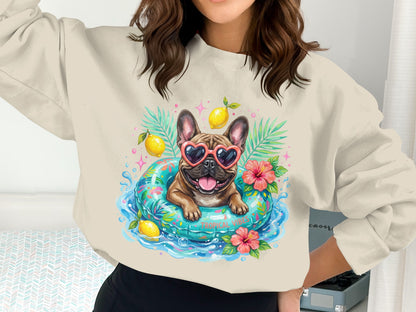 French bulldog wearing heart sunglasses in a pool float with lemons and flowers.