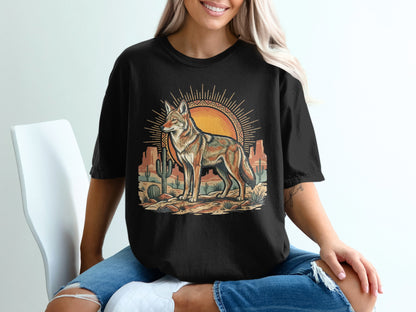 Black t-shirt with a desert coyote and sun graphic.