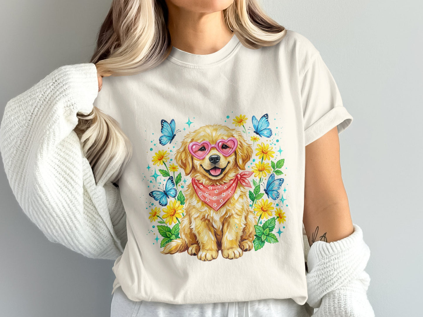 Cream t-shirt with golden retriever wearing heart sunglasses and bandana.