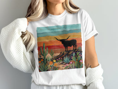 T-shirt featuring a distressed longhorn bull against a desert landscape.