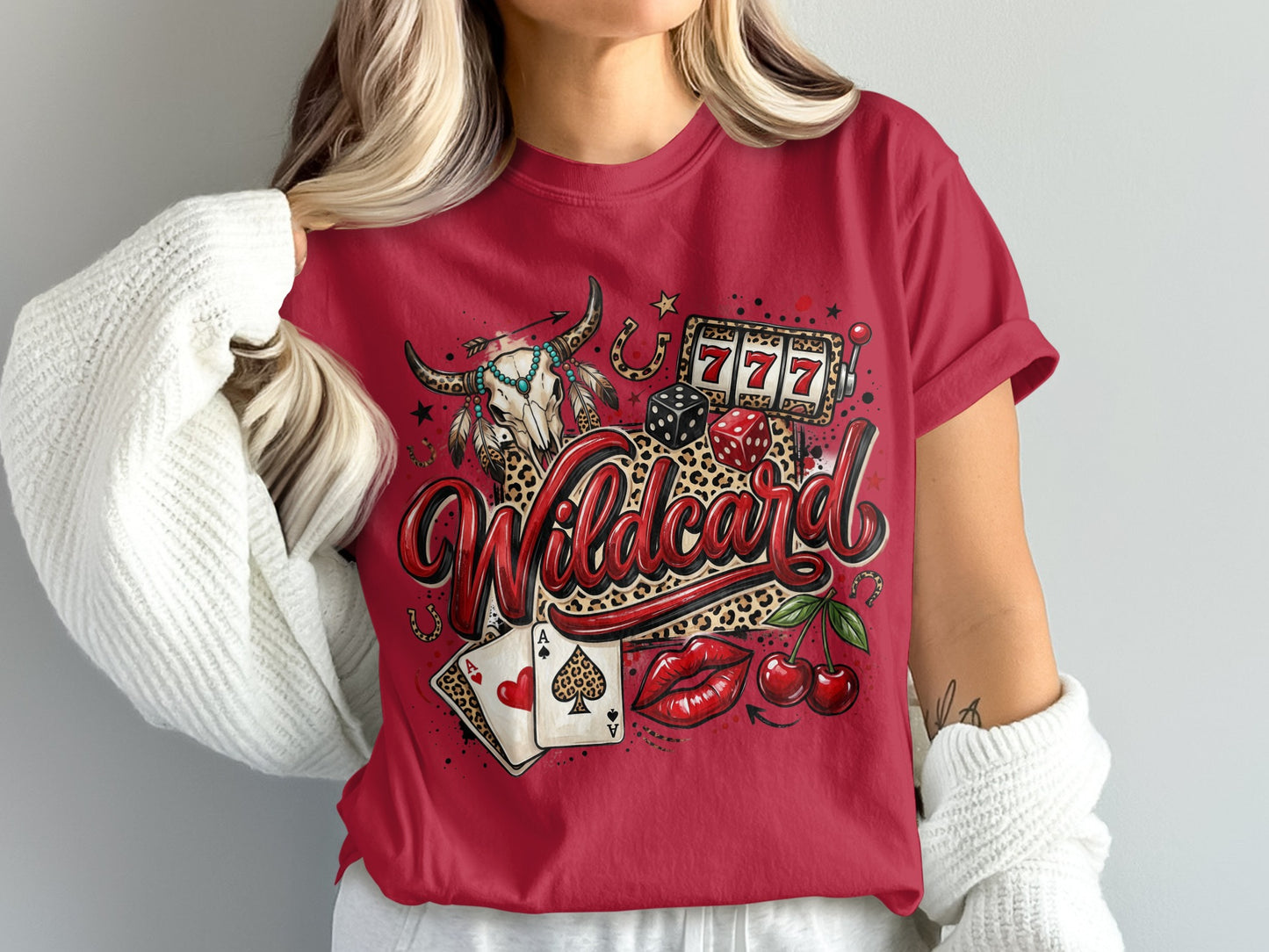 Red t-shirt with "Wildcard" text, bull skull, dice, cherries, and playing cards.