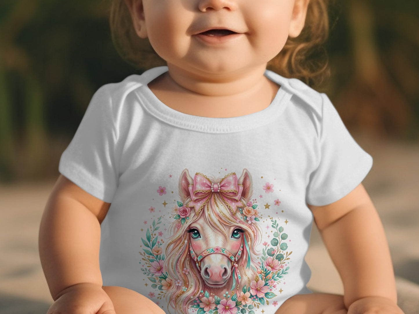 Baby wearing a white bodysuit with a floral horse graphic.