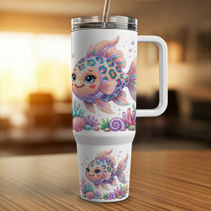 White tumbler with cartoon fish and seashells design.