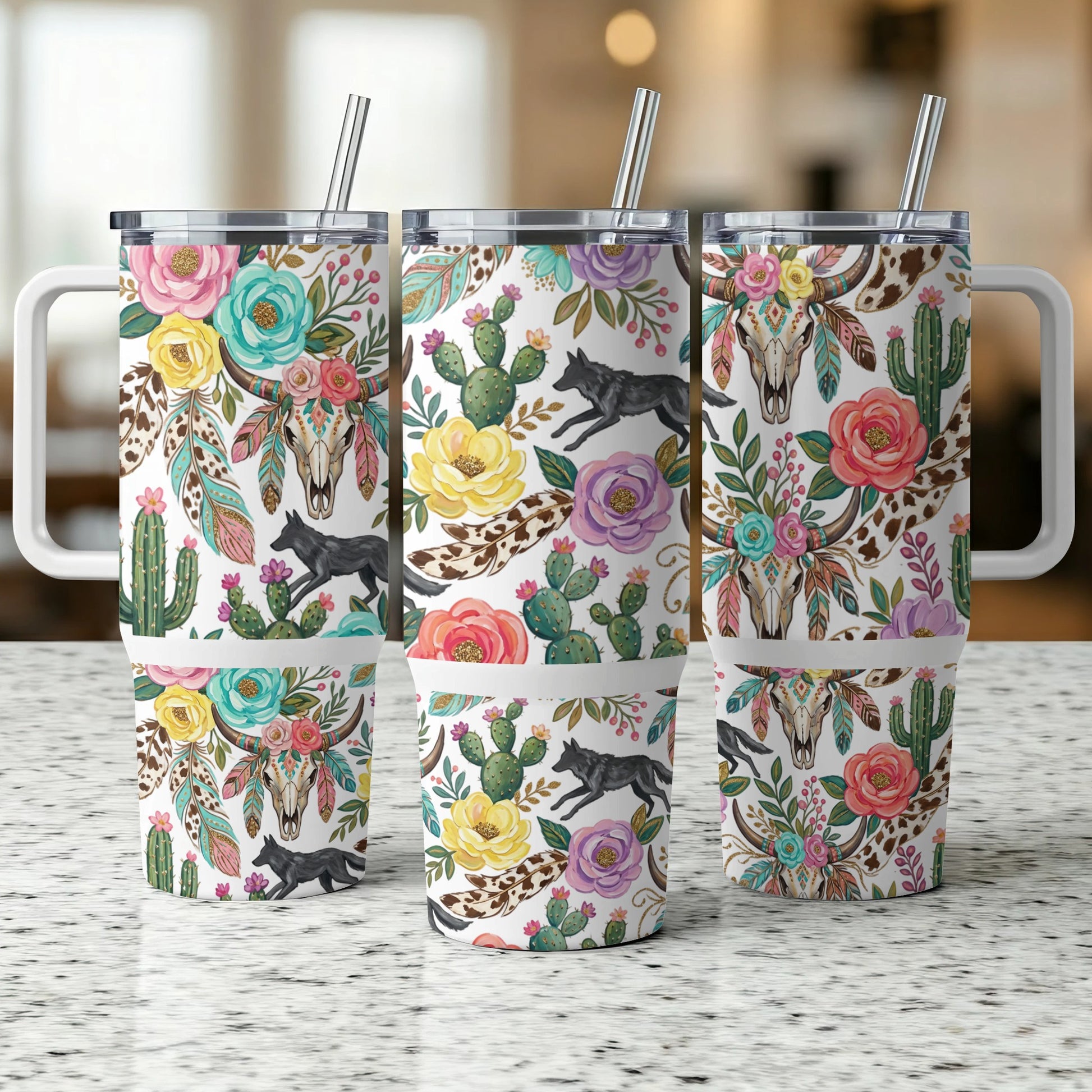 Triptych of tumblers with floral, wolf, and skull designs.