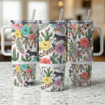 Triptych of tumblers with floral, wolf, and skull designs.