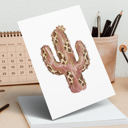 Pink and gold spotted watercolor cactus on white cardstock.