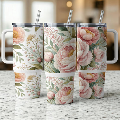 Three insulated tumblers with a floral pattern featuring pink peonies and greenery.