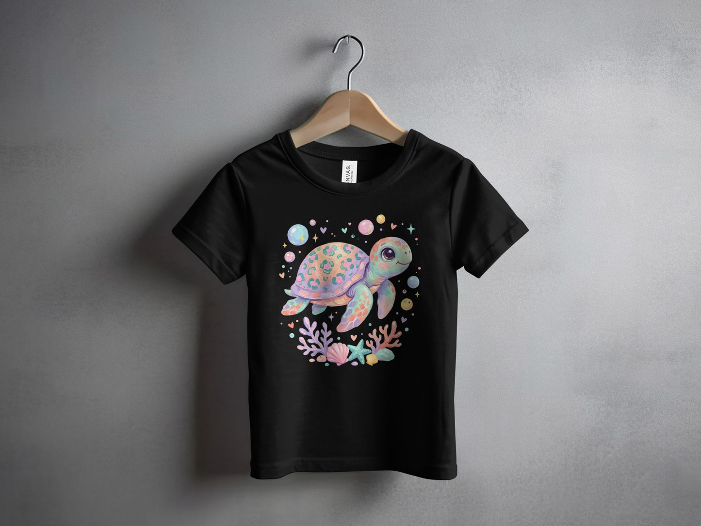 Black t-shirt with a pastel cartoon sea turtle and bubbles design.