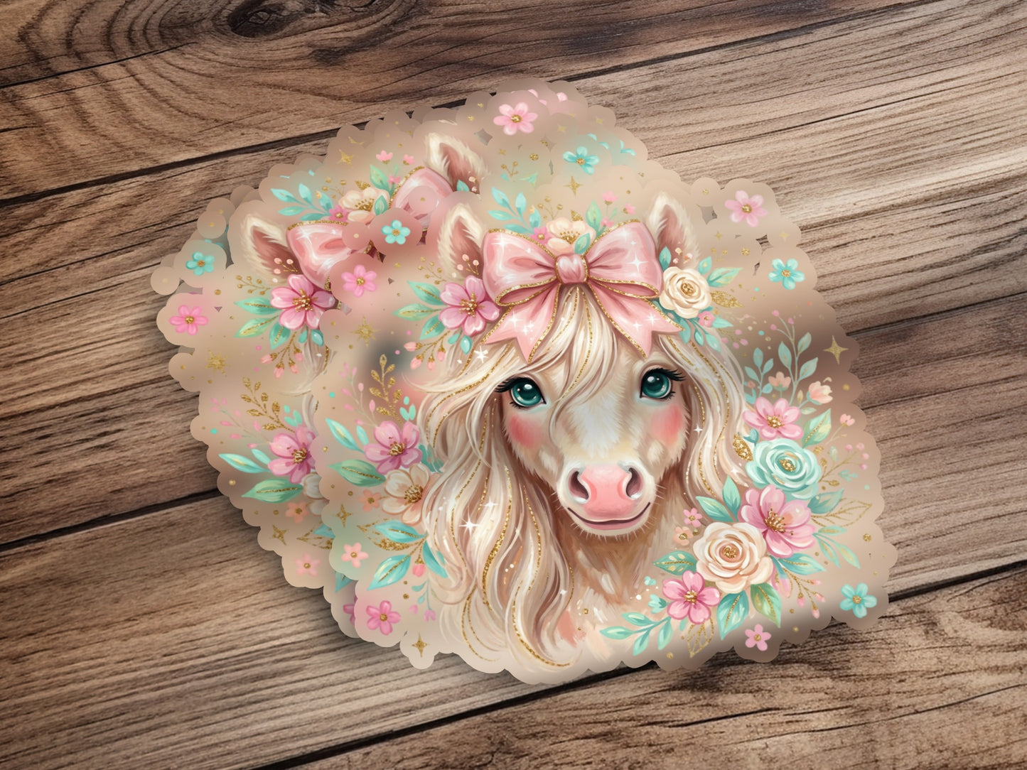 Cute unicorn with flowers and pink bow, on a wooden background.