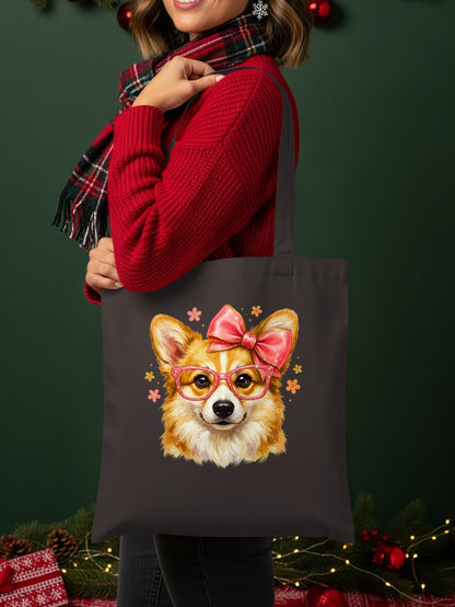 Brown tote bag featuring a cute corgi with a pink bow and glasses.