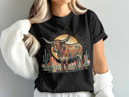 T-shirt featuring a Longhorn steer in a desert landscape with sun and cacti.