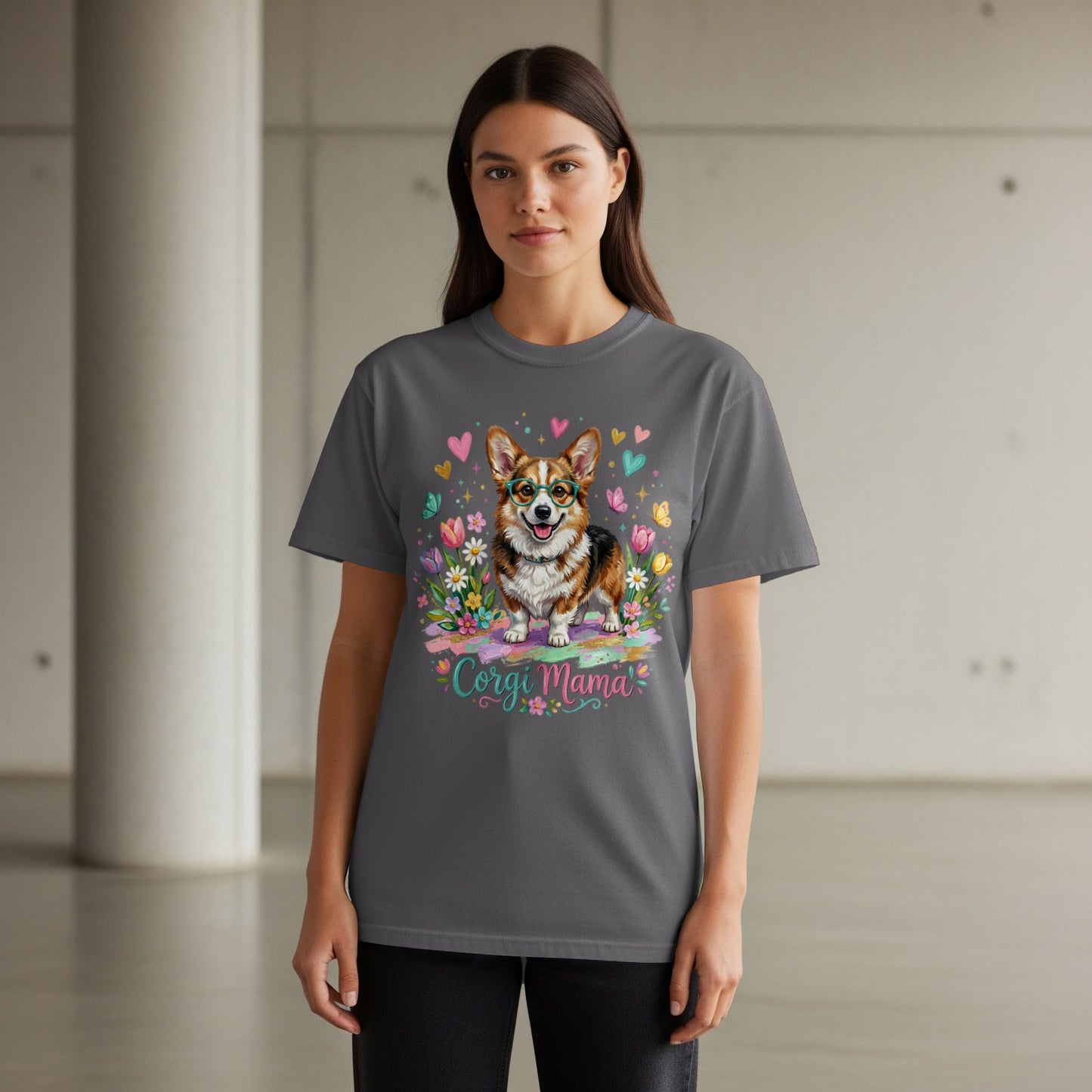 Corgi Mama graphic tee with a corgi wearing glasses surrounded by flowers and hearts.