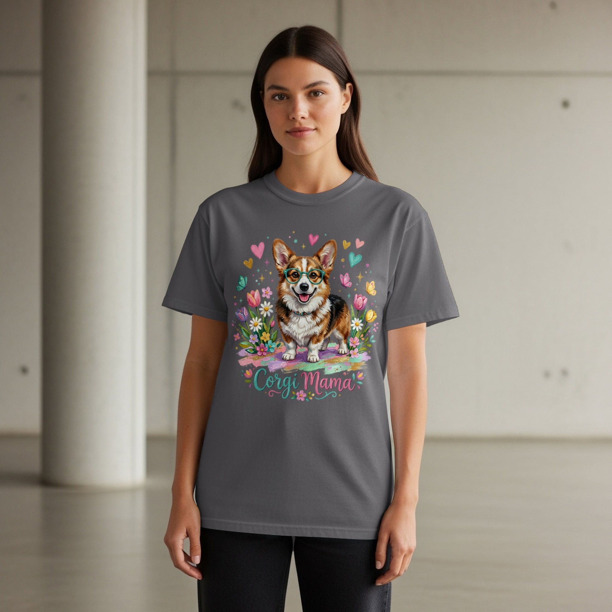 Corgi Mama graphic tee with a corgi wearing glasses surrounded by flowers and hearts.
