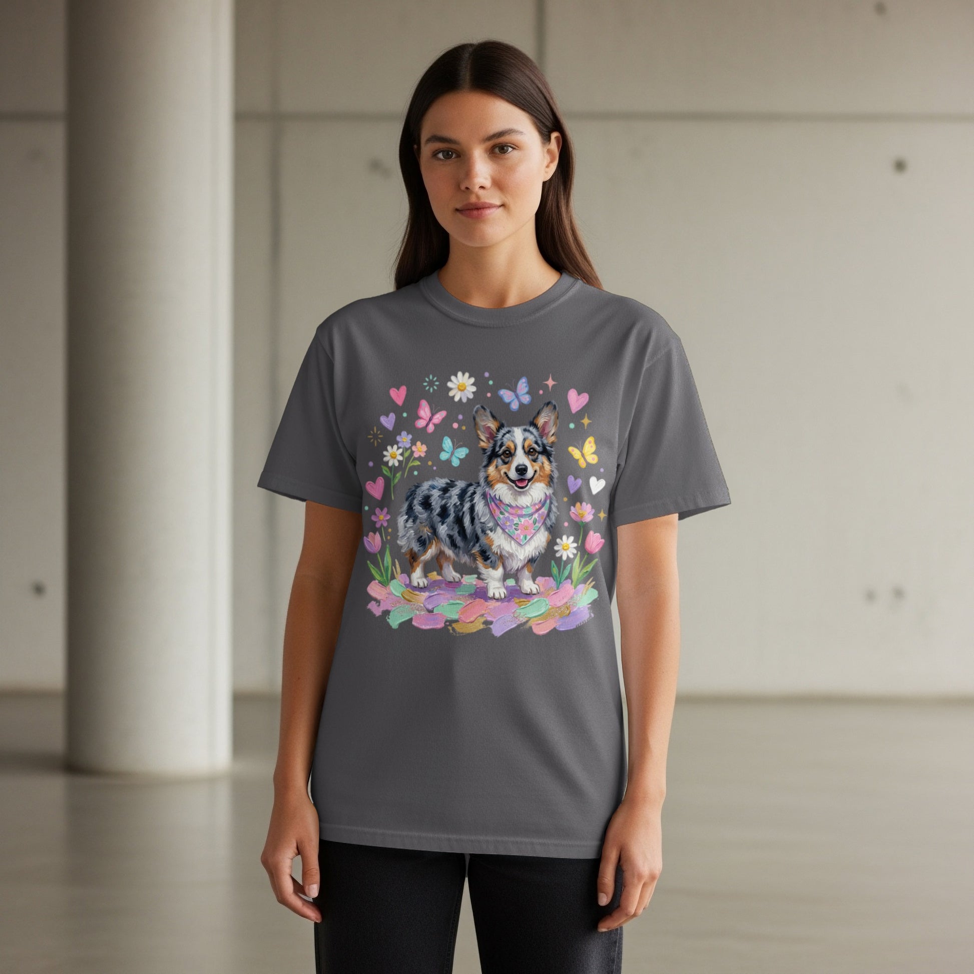 Gray t-shirt with a corgi wearing a bandana and surrounded by flowers and butterflies.