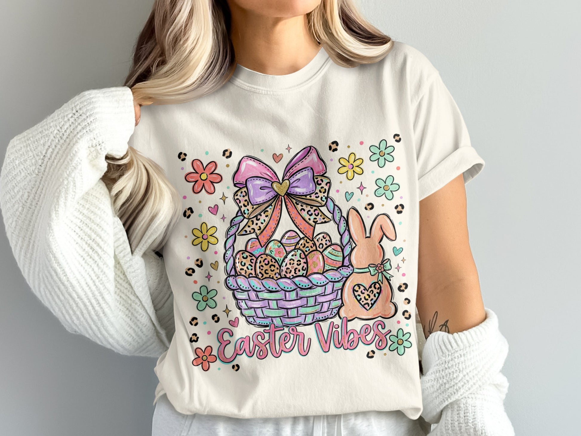 Easter basket with bunny, eggs, and "Easter Vibes" text surrounded by flowers.