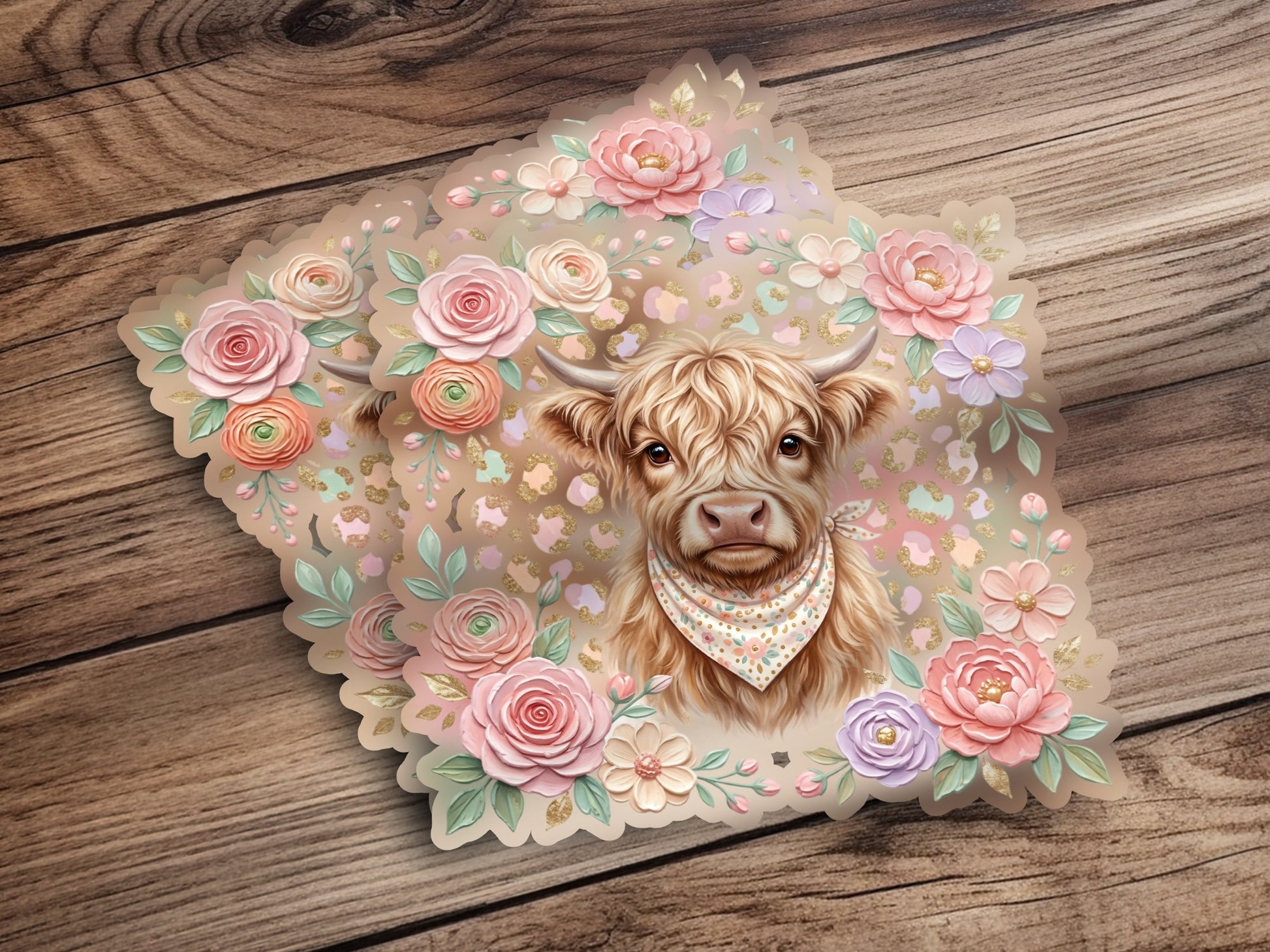Highland cow with floral accents and a patterned bandana.