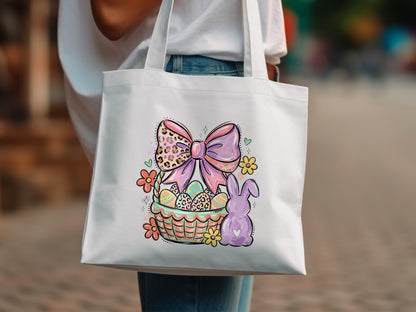 Easter basket with bunny, flowers, and pink bow design on white tote bag.