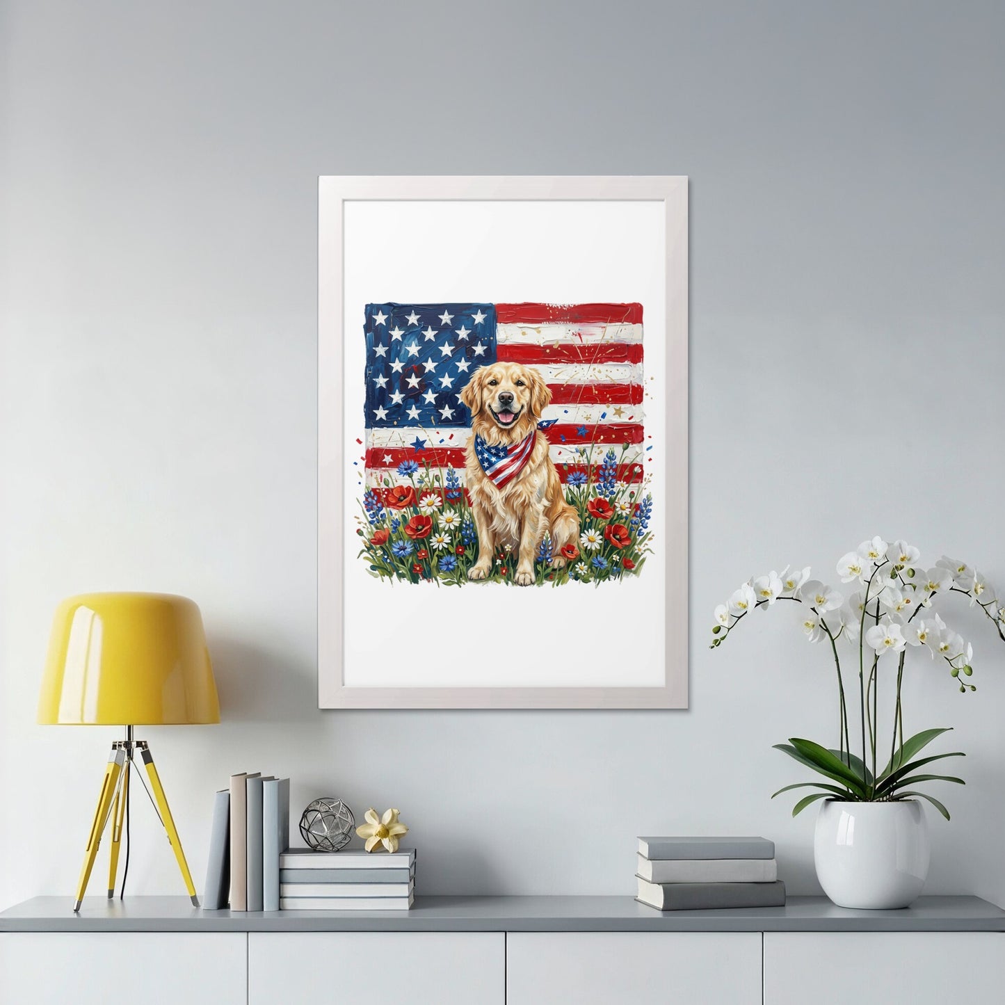 Golden retriever wearing bandana sits before American flag and flowers.
