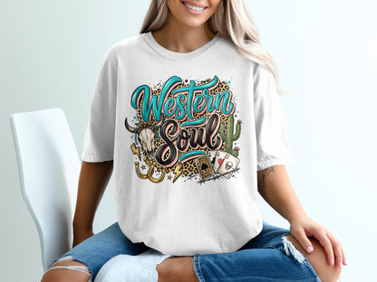 White t-shirt with "Western Soul" text, skull, cactus, horseshoes, and playing cards.
