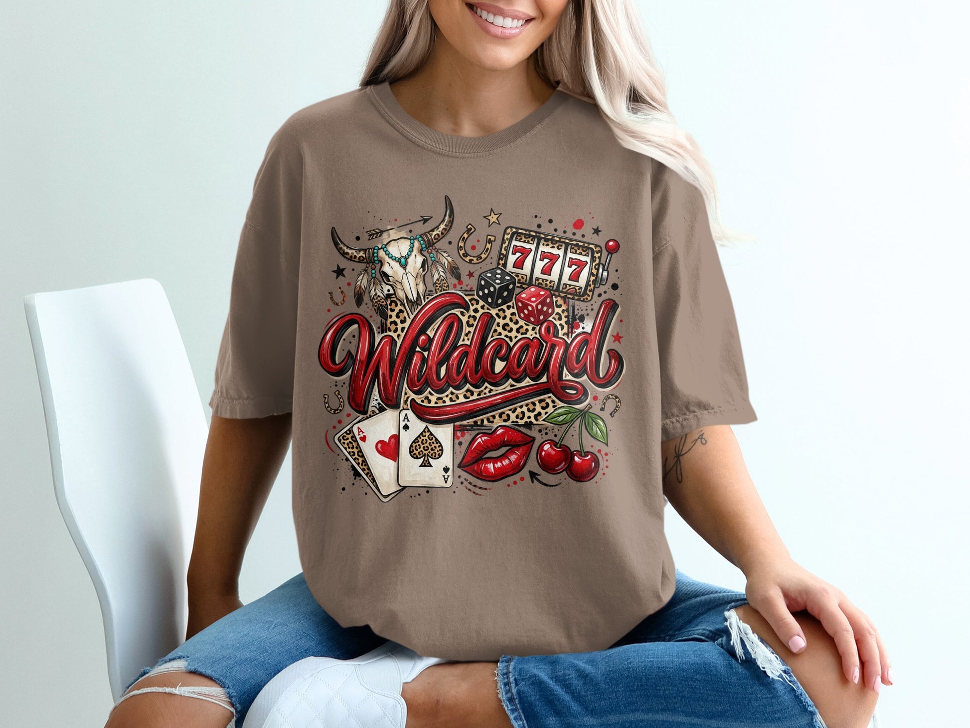 T-shirt with "Wildcard" text, slot machine, cherries, dice, and bull skull graphics.
