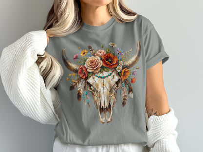 Skull with flowers and turquoise necklace, worn by a person in a white cardigan.