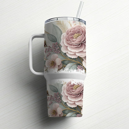 Floral patterned tumbler with handle and straw on a white background.