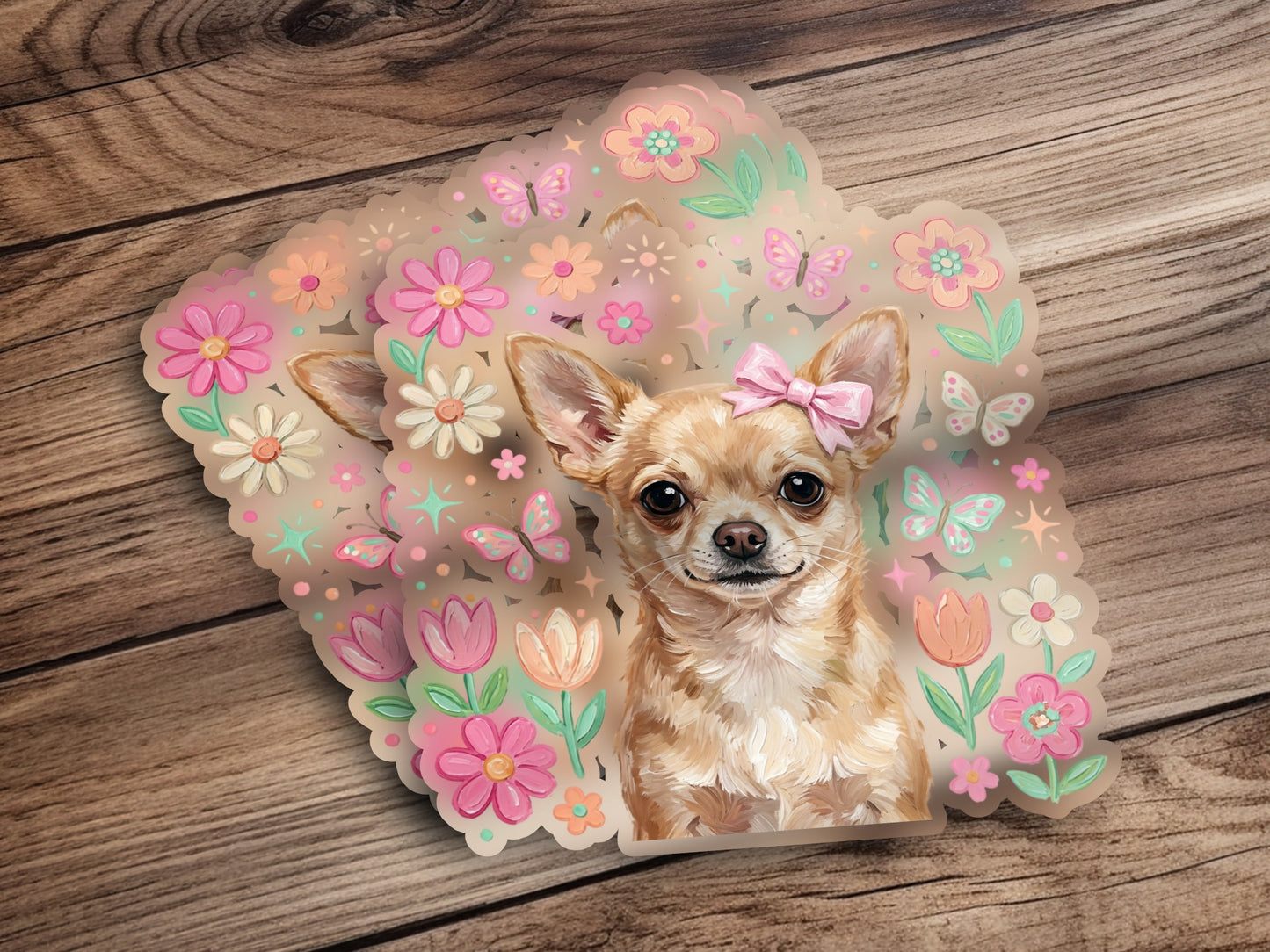 Chihuahua with bow on head surrounded by pastel flowers and butterflies.