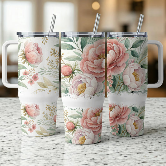 Three white tumblers with pink peony floral design and handles.