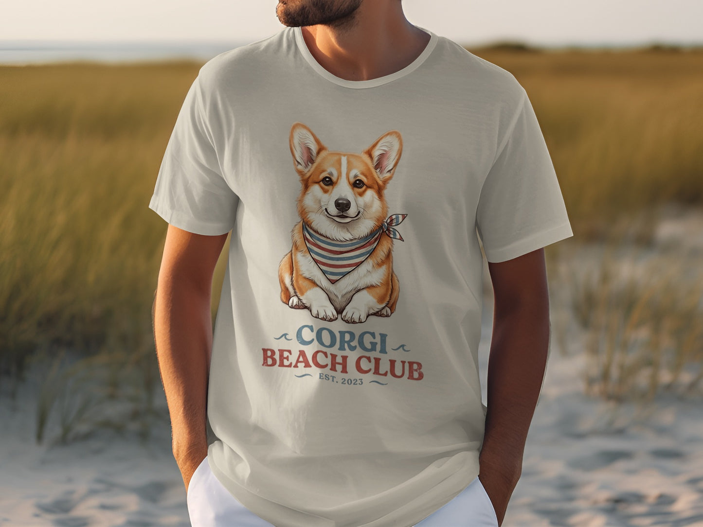 Corgi wearing bandana on t-shirt with "Corgi Beach Club" text.
