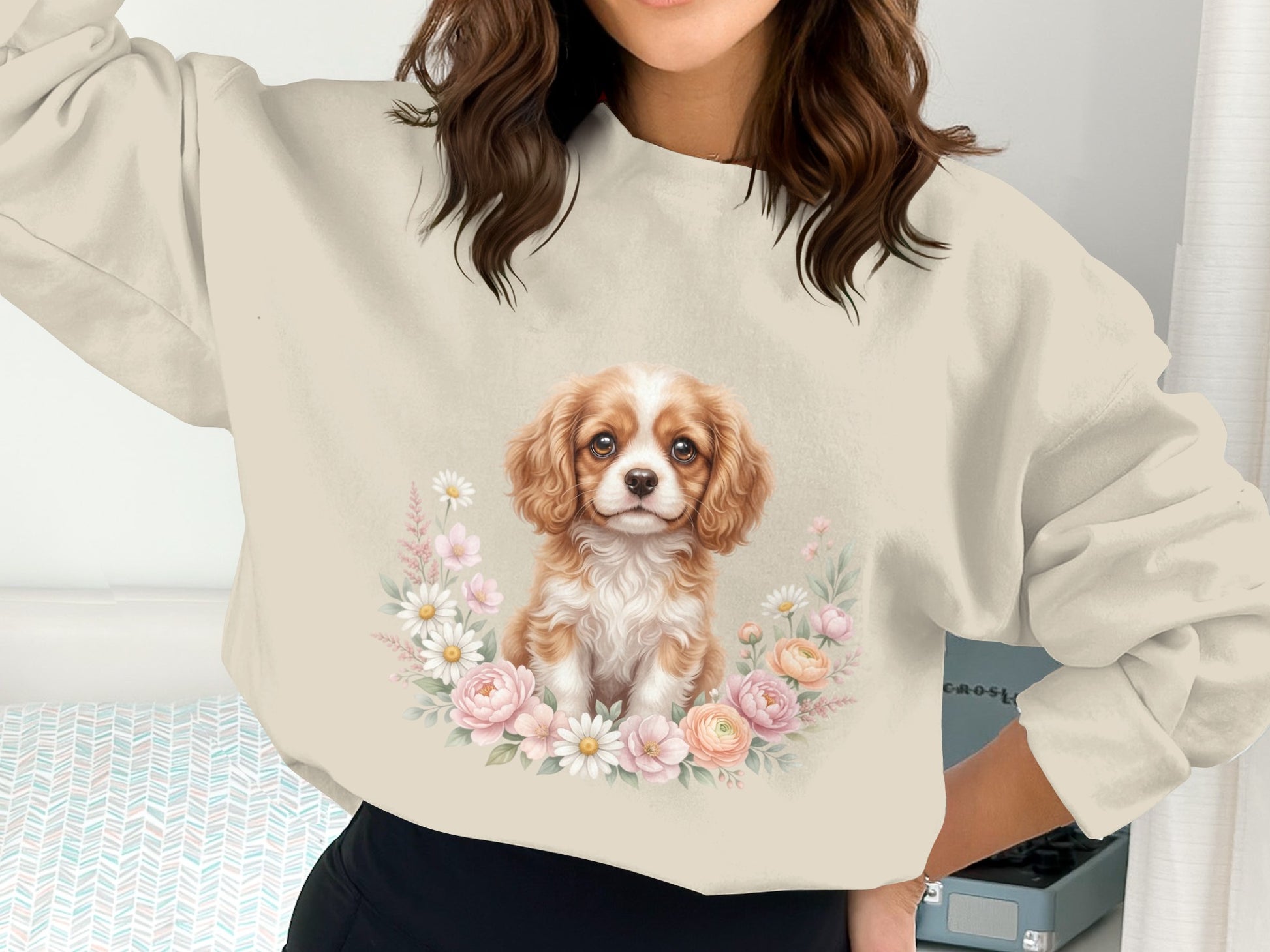Cream sweatshirt with a Cavalier King Charles Spaniel puppy in a floral wreath.