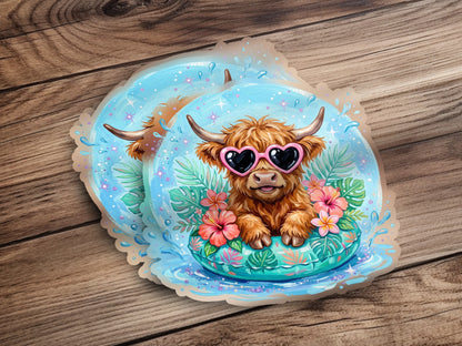 Highland cow in sunglasses and a float, surrounded by water and tropical flowers.