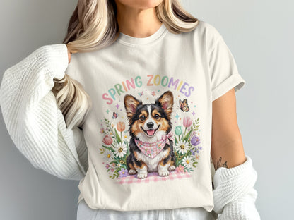 T-shirt with a happy corgi wearing a bandana and surrounded by flowers.