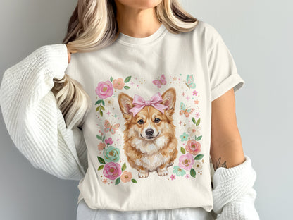 Corgi wearing a pink bow with floral and butterfly border.