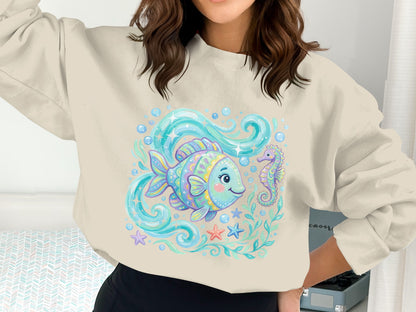 Light blue crewneck sweatshirt with whimsical fish, seahorse, and starfish graphic.
