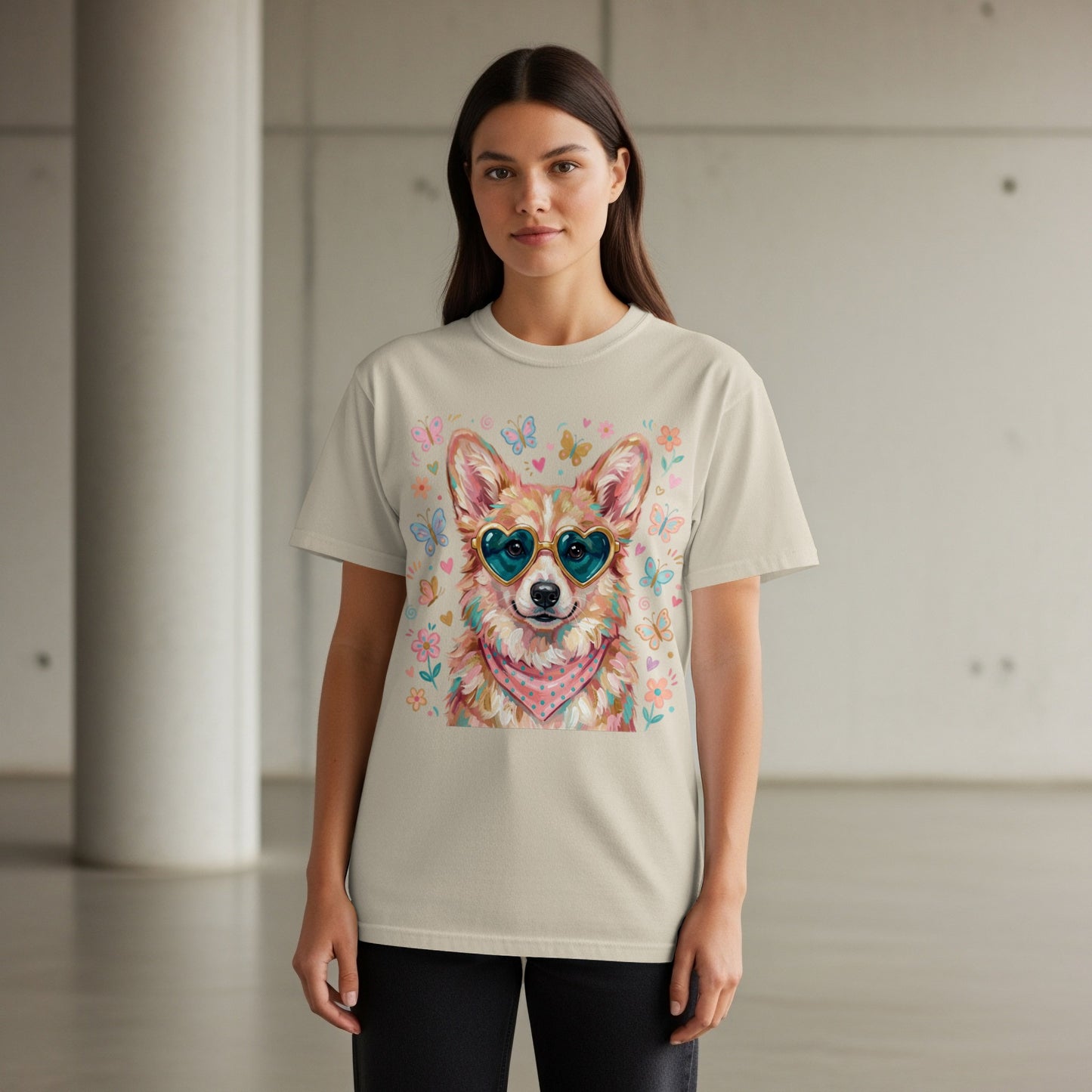 Tan t-shirt with a corgi wearing heart sunglasses and floral, butterfly pattern.