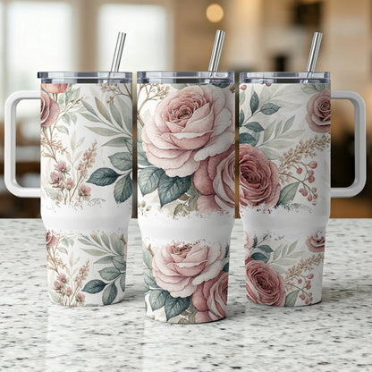 Three tumblers with a floral pattern of pink roses and greenery.