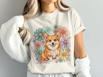 Corgi dog surrounded by pastel flowers on a cream t-shirt.