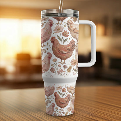 White tumbler with a pink chicken and floral pattern.